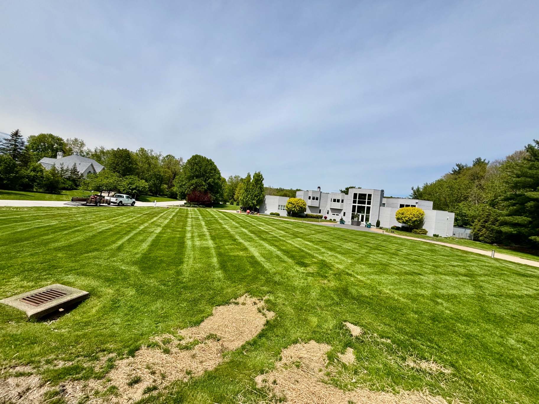 Striped lawn on a modern estate property
